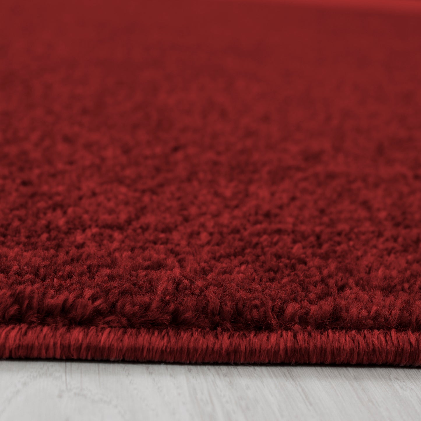 CALIFORNIE - Tapis uni à poils courts - CAL7000ROU