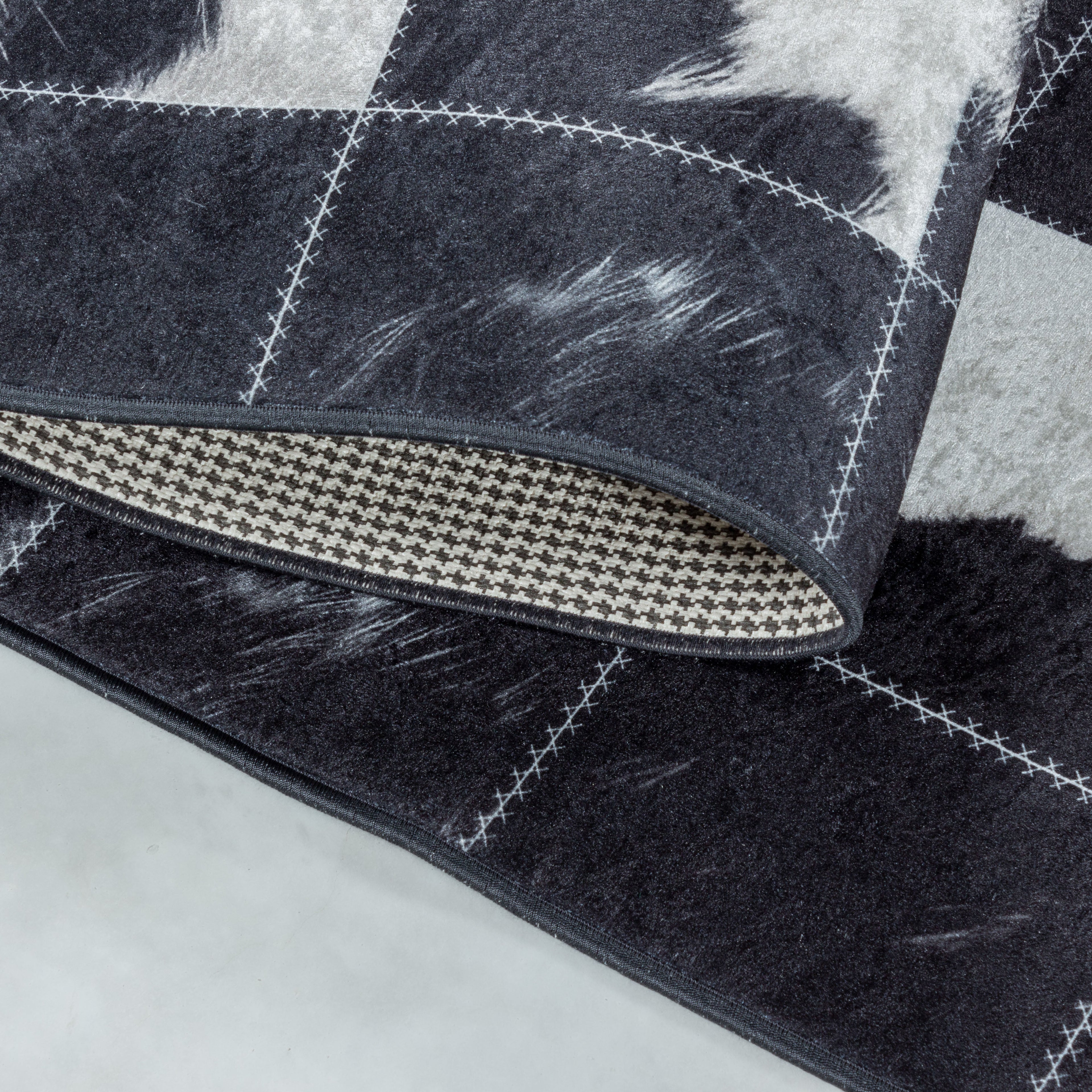 FIESTA - Tapis patchwork imitation peau noir et blanc - FIE4307NOI FIESTA