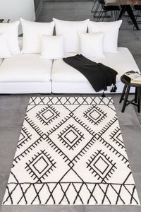 Tapis à poils longs crème et noir Nazar rugs