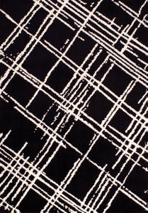 Tapis abstrait noir motif géométrique Nazar rugs