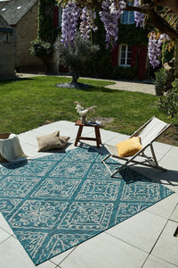 Tapis avec ornement floral turquoise Nazar rugs