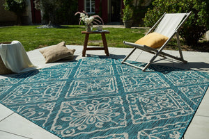 Tapis avec ornement floral turquoise Nazar rugs