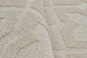 Tapis crème motif géométrique en relief Nazar rugs