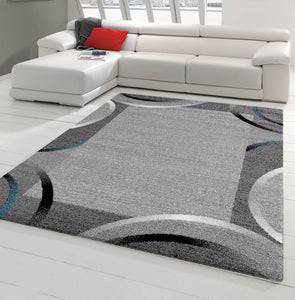 Tapis de salon design graphique bleu et gris Nazar rugs