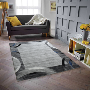 Tapis de salon design graphique bleu et gris Nazar rugs