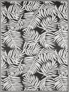 Tapis motif floral noir et blanc Nazar rugs