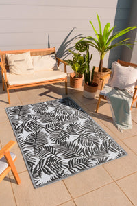 Tapis motif floral noir et blanc Nazar rugs