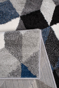 Tapis motif graphique bleu Nazar rugs