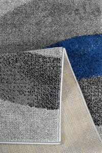 Tapis salon motif graphique bleu Nazar rugs